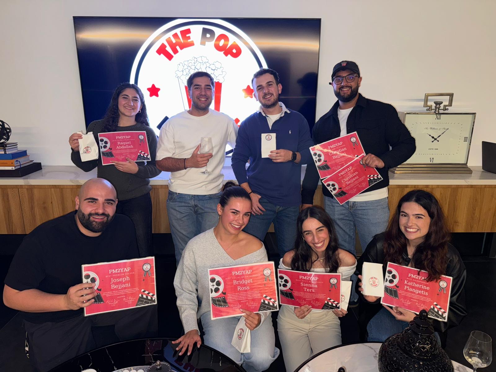 The Pop Masters team at a community event